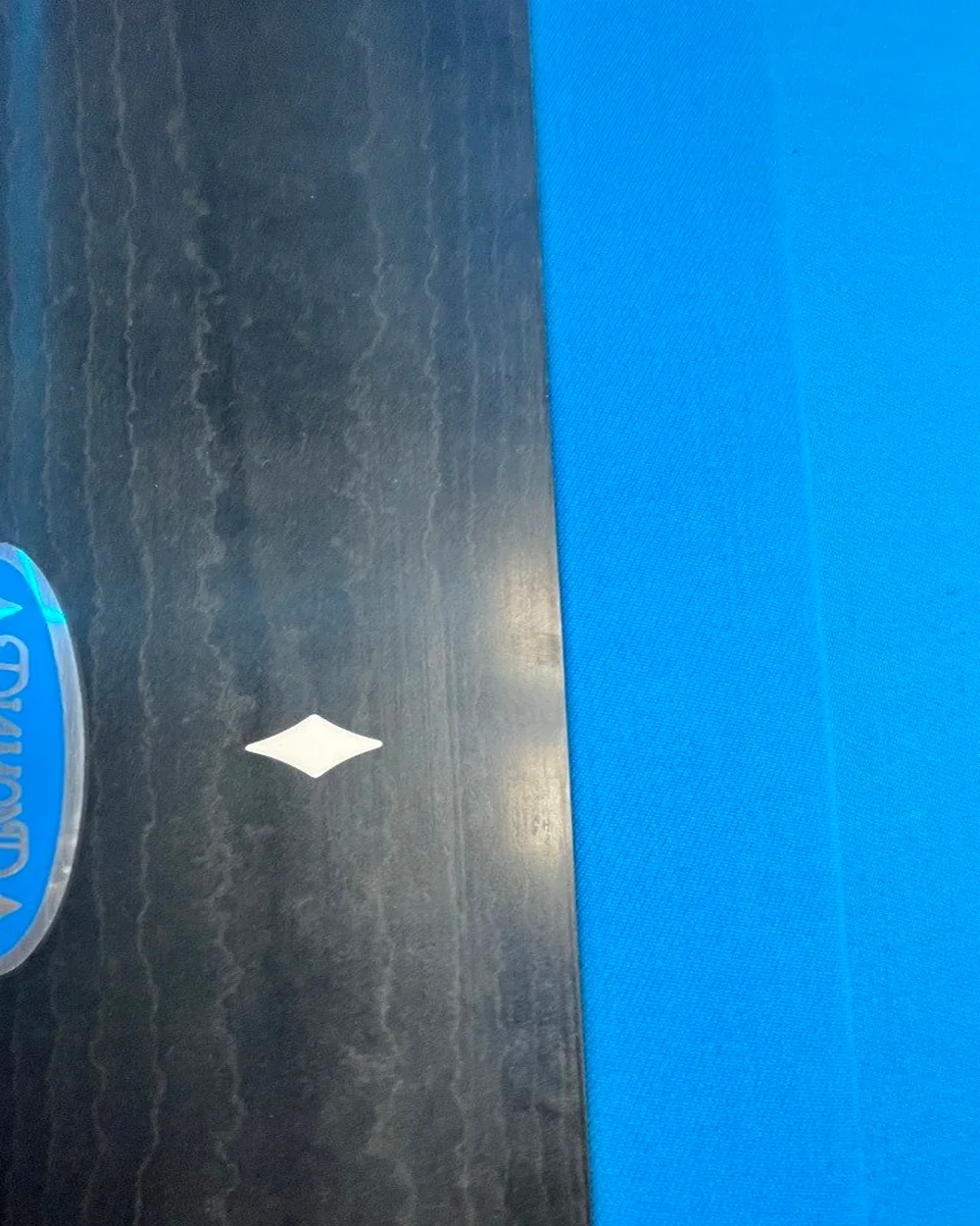Diamond logo detail on the American Pool table